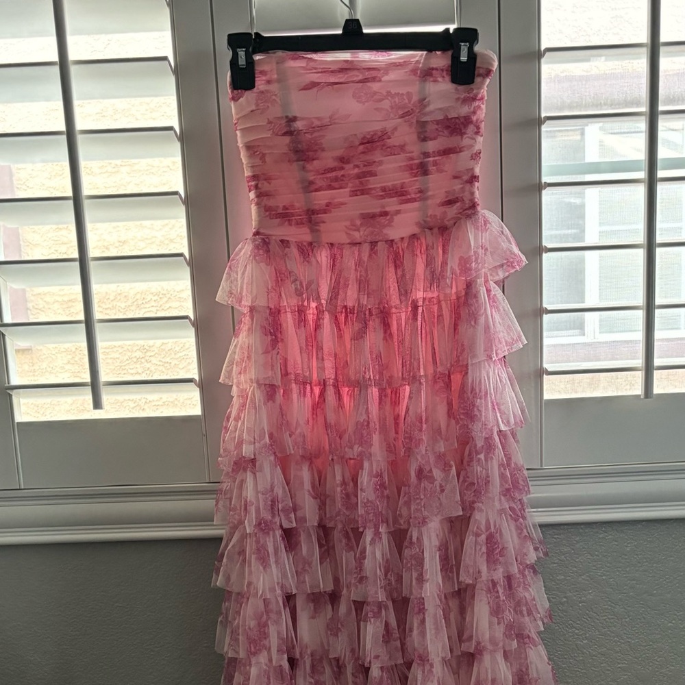 Liliane Garden Rose Windsor 2024 prom dress. Pink tiered ruffle floor length